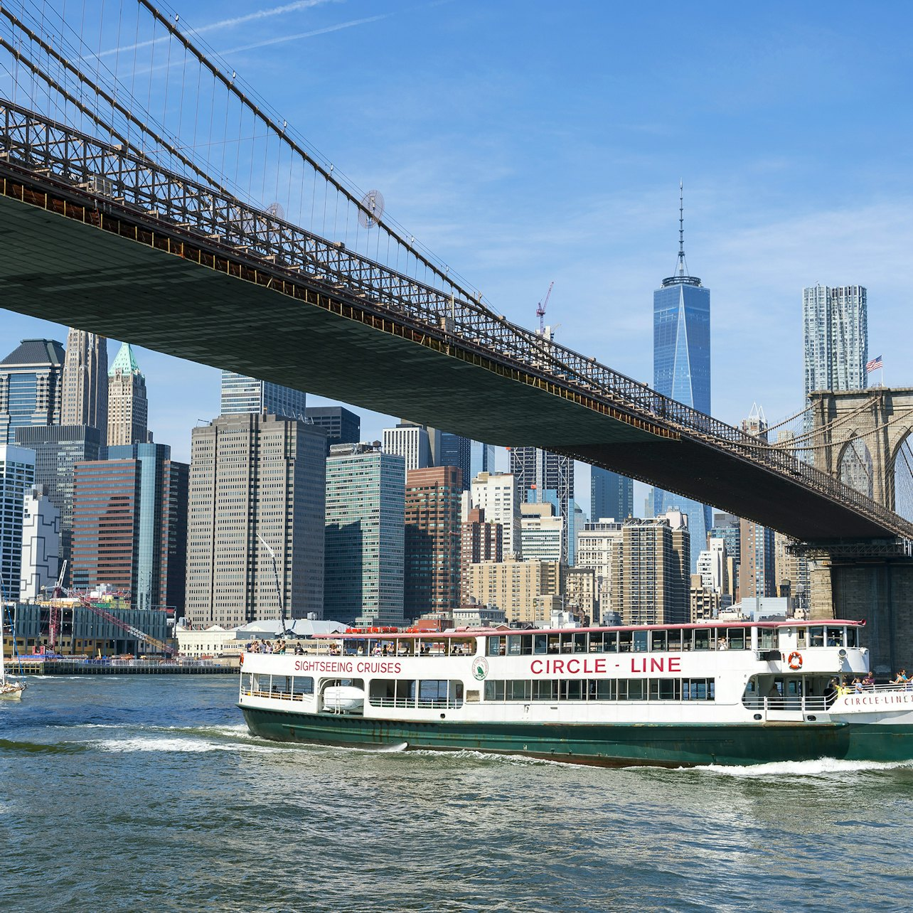 Experience stunning views of New York's skyline while cruising beside iconic landmarks. Enjoy insightful commentary tasty snacks and free WiFi as you glide toward the Statue of Liberty.